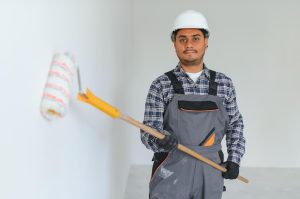 Professional painters improving a home's appearance before property sale
